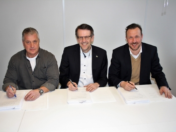 Unterzeichnung des Share Purchase Agreement